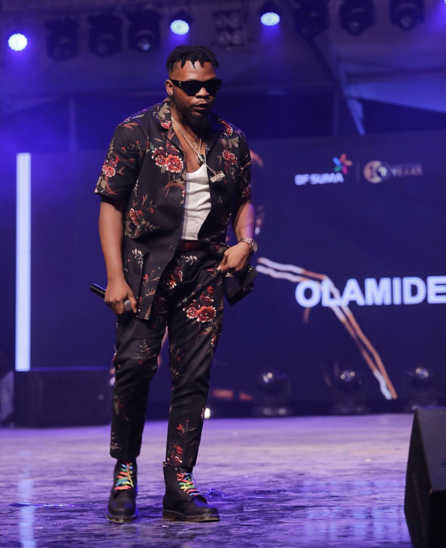 Olamide performing on stage at the BfsumaGhana concert