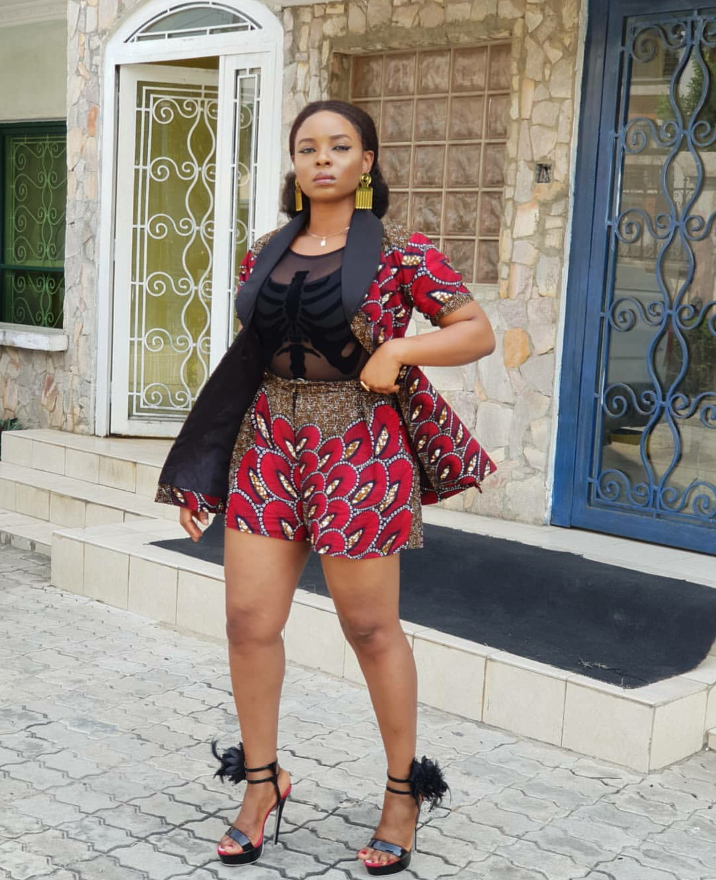 Yemi Alade served style goals in this two-piece African print pant and jacket