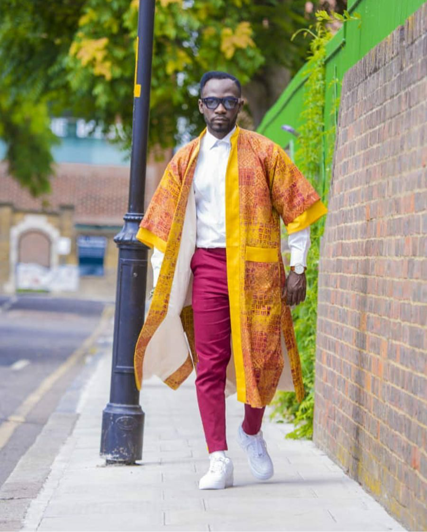 Okyeame Kwame was dapper and slayed in this kimono over shirt and pants
