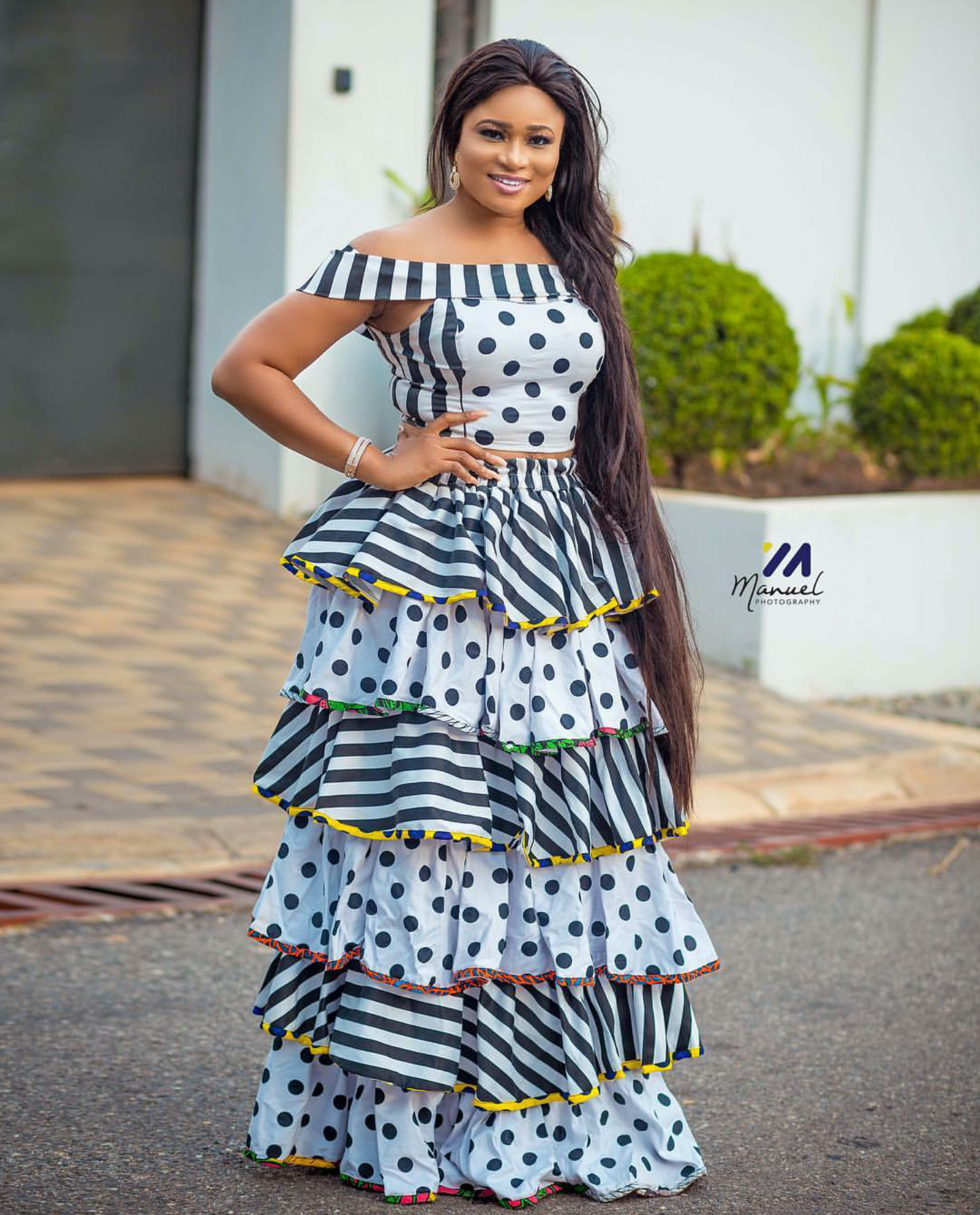 Christabel Ekeh served style goals in this two piece polka dots and stripes top and raffled skirt