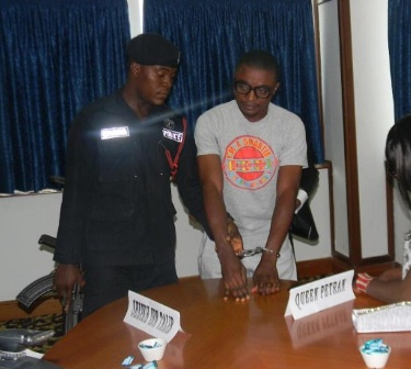 Deeba in handcuffs