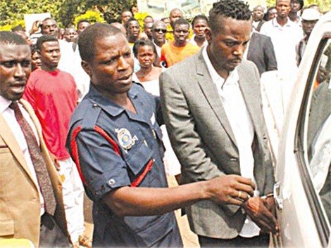 Kwaw Kese in handcuffs