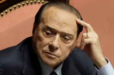 What political party does Silvio Berlusconi belong to? How long was Silvio Berlusconi in power?
