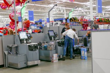 Why is Walmart removing self-checkout kiosks and which stores are affected?